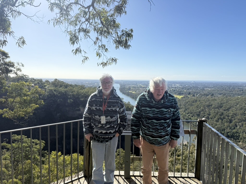 Two people enjoying a scenic lookout together