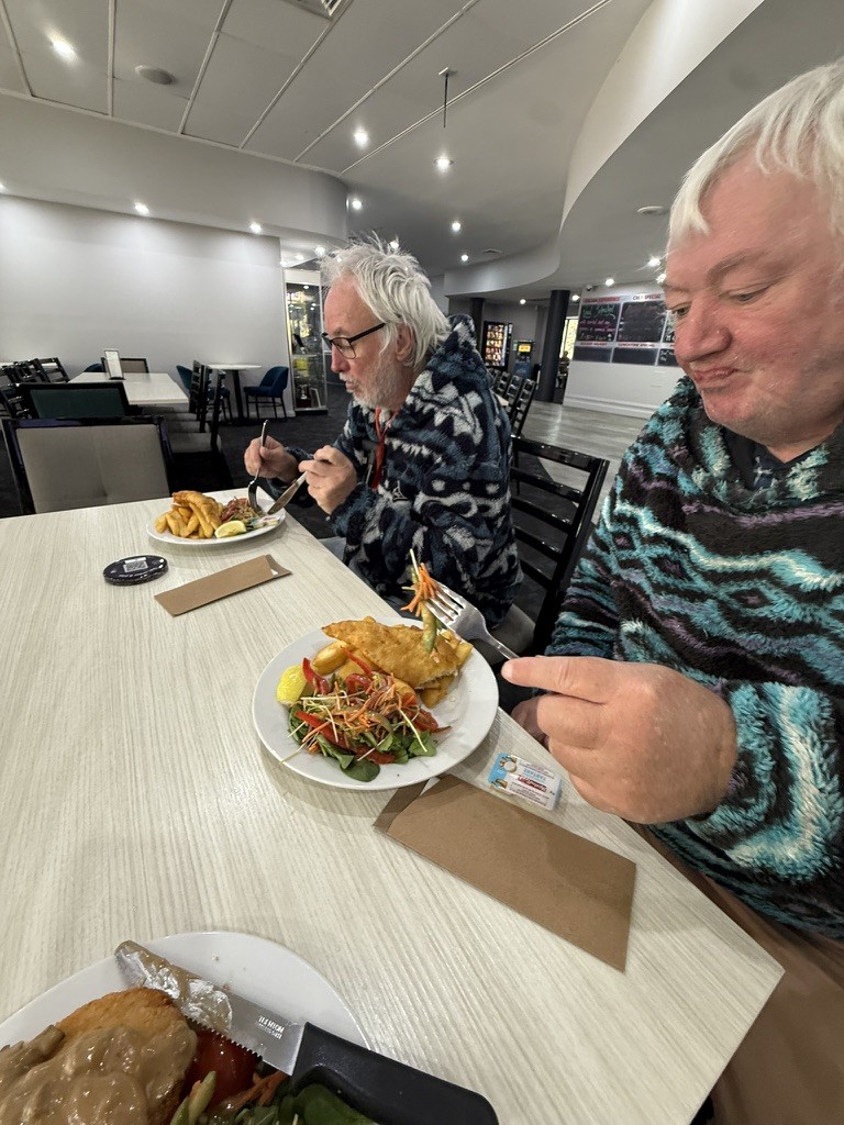 Two people sharing a meal together